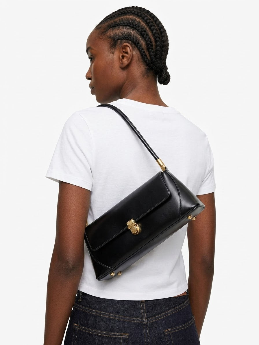 Black leather structured mini shoulder bag with gold detail