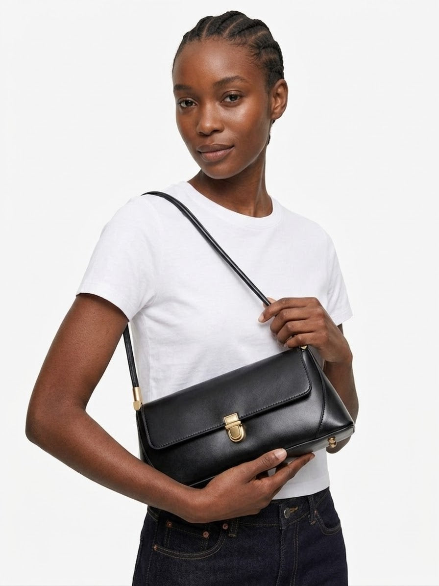 Black leather structured mini shoulder bag with gold detail