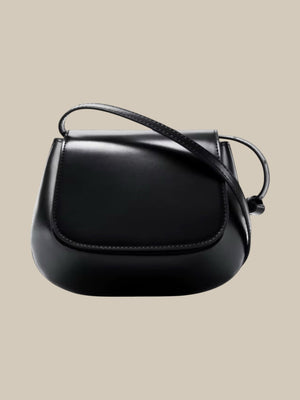 Leather structured mini cross body bag in black